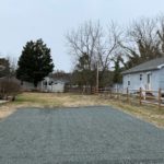 Hardscaping results featuring a new graveled driveway