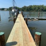 A like-new wooden walkway after pressure washing